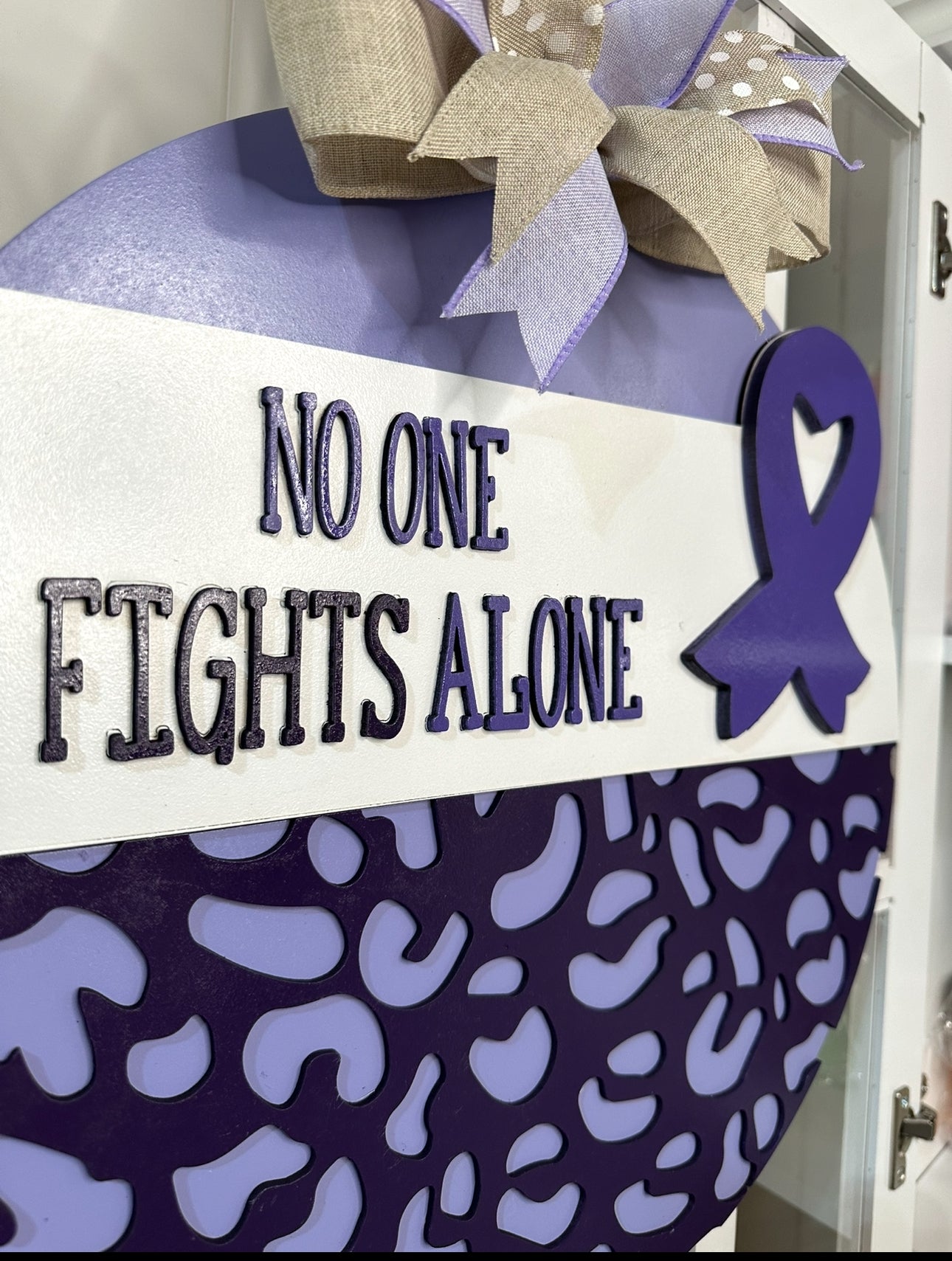 Ribbon No One Fights Alone Sign