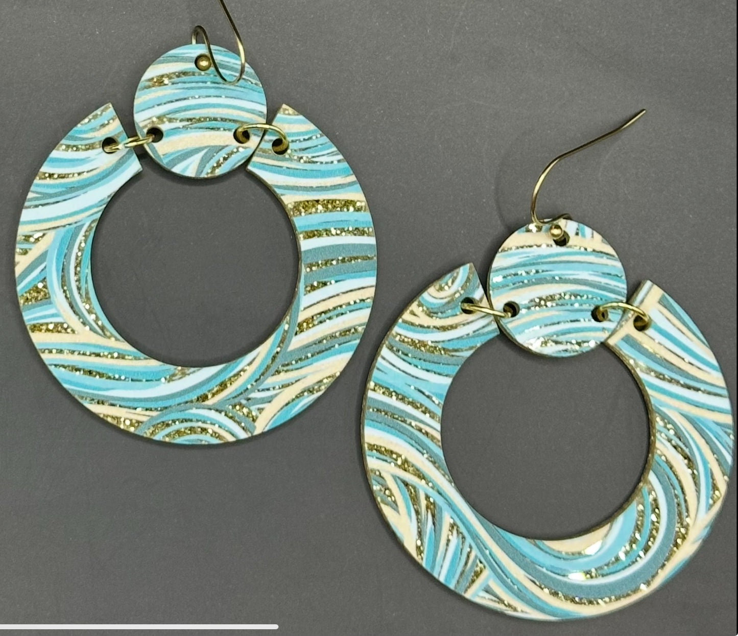 Acrylic Teal, and Gold Glitter Swirl Round Earrings.